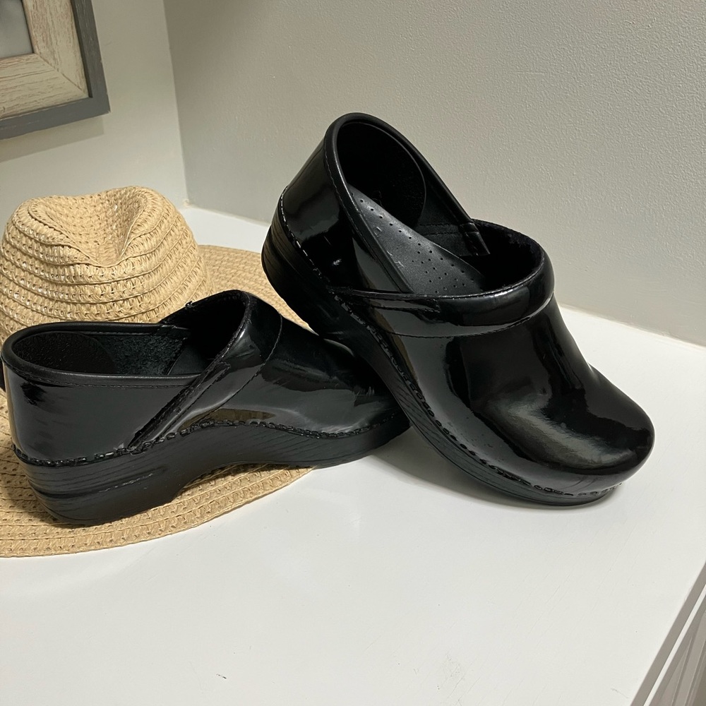 Dansko patent leather clogs